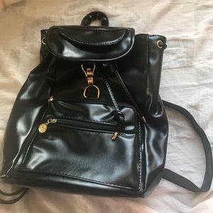 Black backpack never used